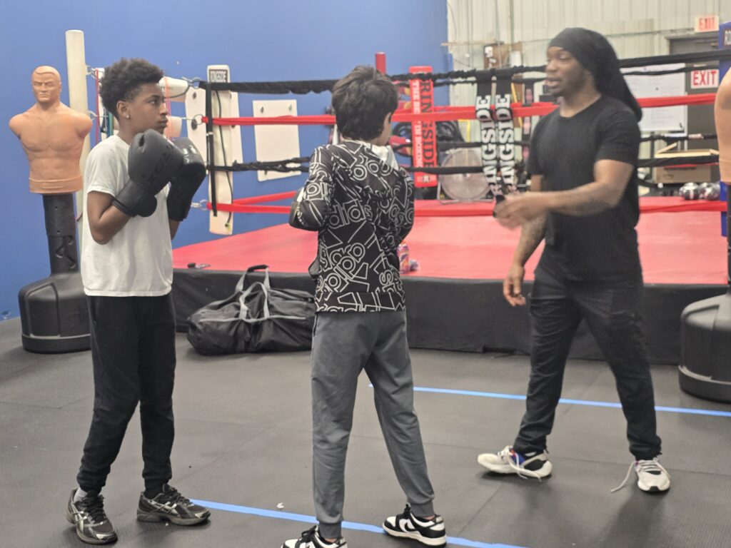 Students practicing with their gloves